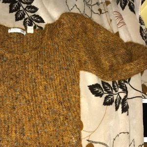 Orange vintage sweater with specks of blue🤗